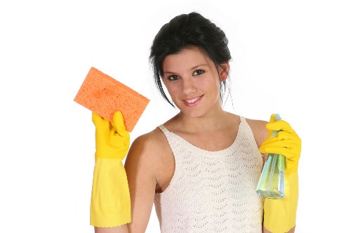 Professional upholstery cleaning for a fabric sofa in a local home