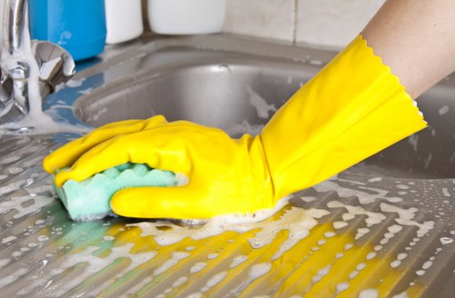 Sofa cleaning technician assessing fabric condition for safety