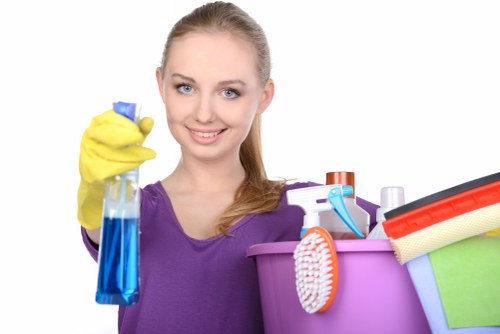 Professional carpet cleaner working on a residential hallway carpet
