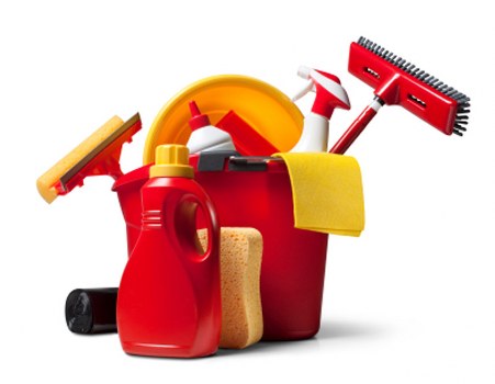 Professional cleaners preparing a kitchen and living space for a local customer